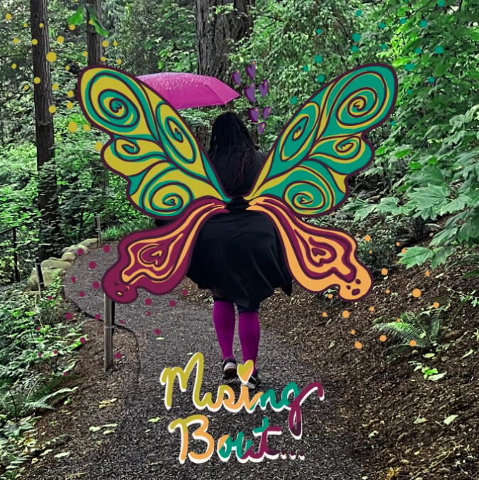 lady t, artist, walking on a path through an enchanted forest with a magenta umbrella while wearing all black with painted butterfly wings on back.